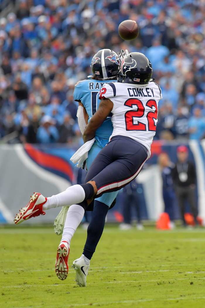 Dec 15, 2019; Texans cornerback Gareon Conley (22) blocks a pass intended for Titans receiver Kalif Raymond (14). Mandatory Credit: Jim Brown-USA TODAY Sports